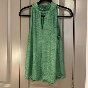 Cute green top with triangle cut out